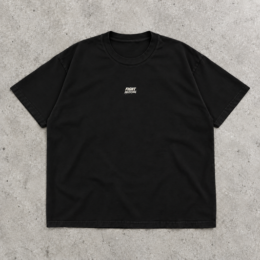 Fight Maxxing relaxed tee in black, laid flat on grey cement