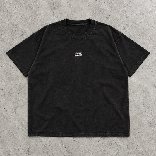 Fight Maxxing relaxed tee in black, laid flat on grey cement